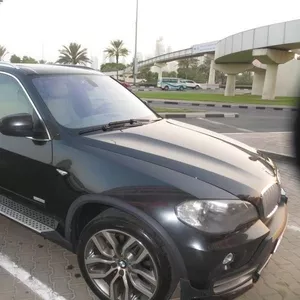 BMW X 5 Черный цвет 2010 модель .. полный вариант..