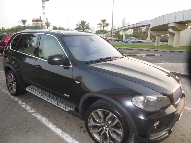 BMW X 5 Черный цвет 2010 модель .. полный вариант..