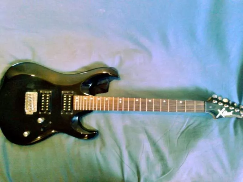 Продам гитару Сort X1
